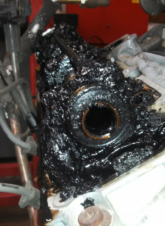 image of motor oil sludge in engine
