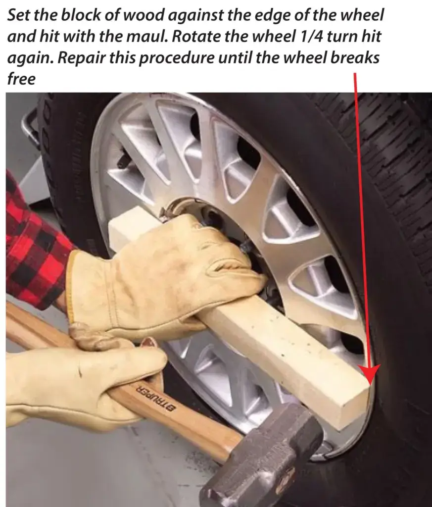 remove stuck wheel with maul