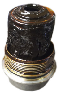 Oil filter packed with sludge