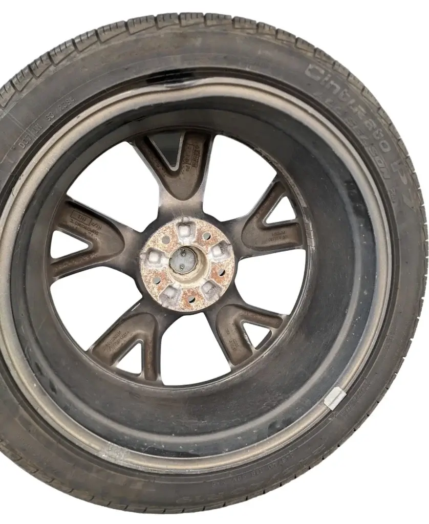This image shows a bent alloy wheel