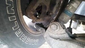 Picture of broken ball joint from sliding into a curb