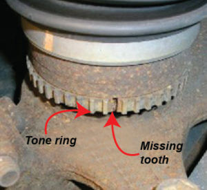 This image shows an ABS tone ring with a missing tooth