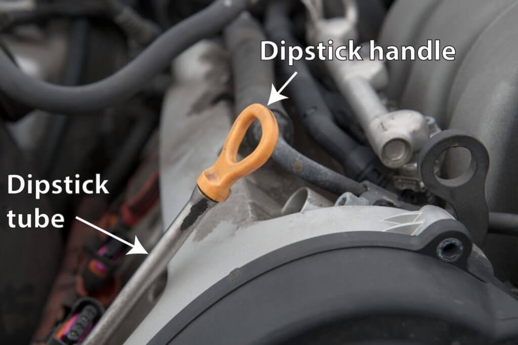 Location of oil dipstick in engine