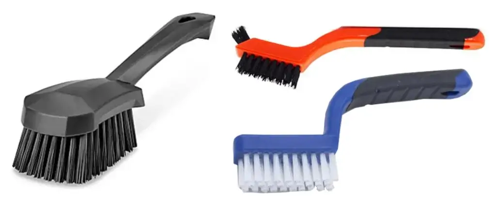 This image shows an assortment of stiff nylon brushes for cleaning an engine bay.