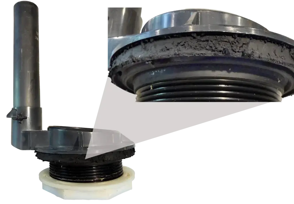 This image shows a chlorine damaged flush valve seal