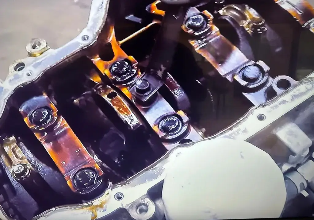 This image shows varnish buildup on crank bearings