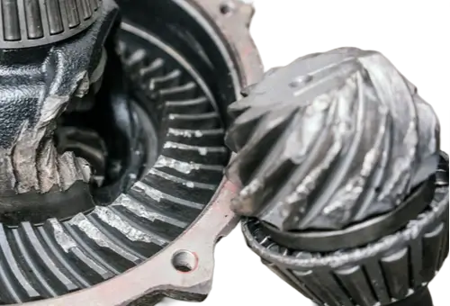 this image shows a worn out ring and pinion gear from neglected differential fluid changes