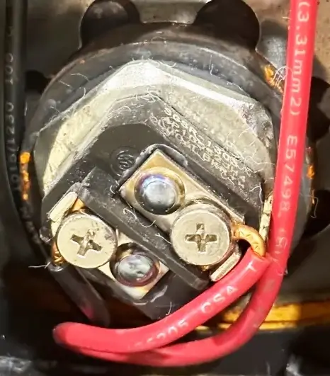 this image shows the screw terminals on a water heater element