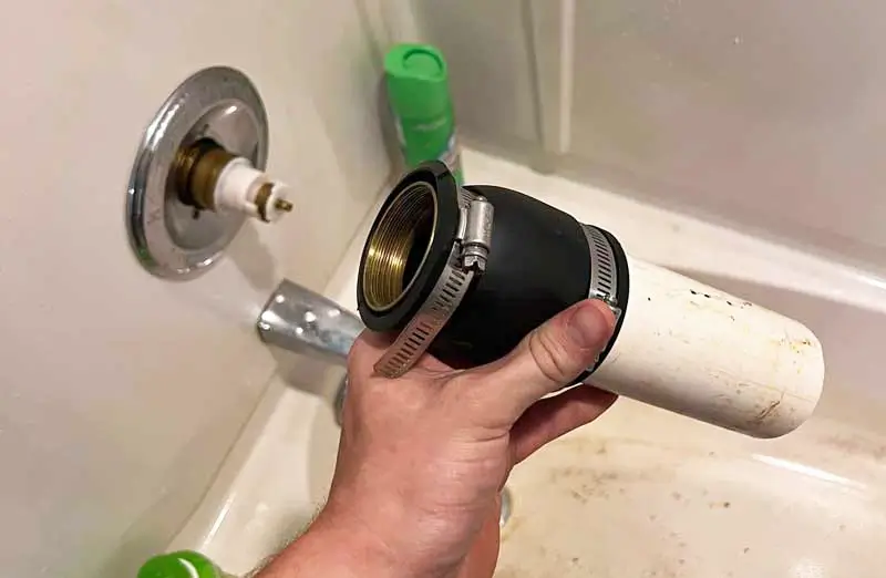 this image shows a successfully remove delta bonnet nut using a fernco coupling