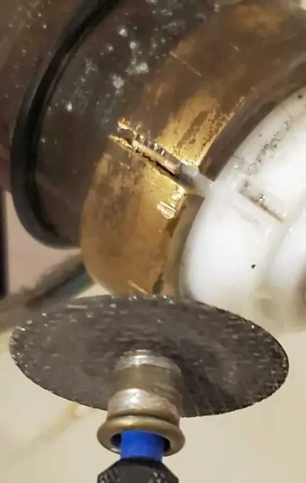 this image shows how to cut a slot in a delta bonnet nut