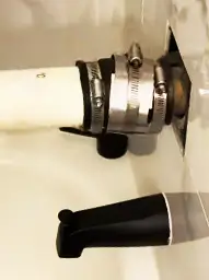 this image shows a fernco with pvc pipe added